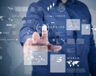 14038735-businessman-standing-and-working-wth-touch-screen-technology